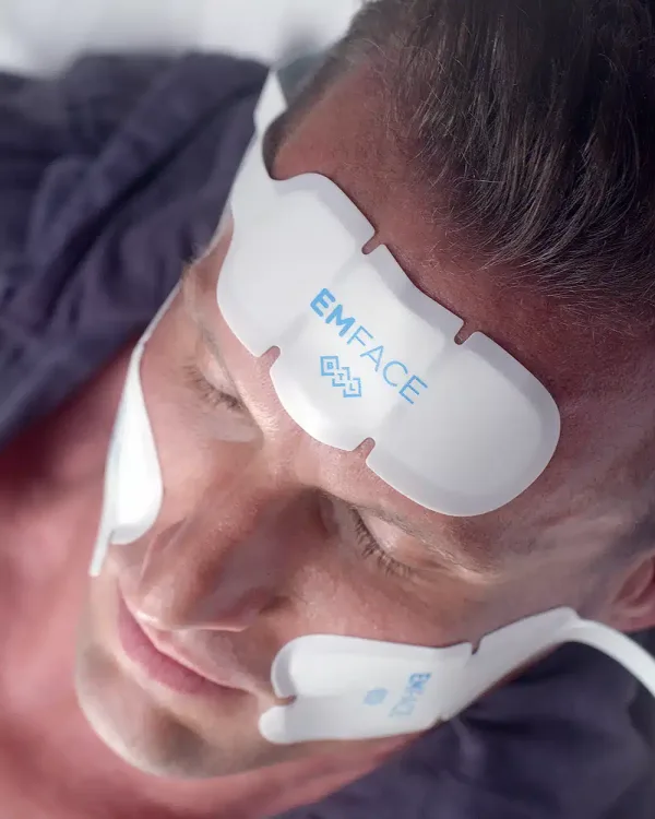 Emface treatment for men tackling wrinkles from the inside out. The RF energy heats your skin, ramping up collagen and elastin production for a smoother, more youthful look